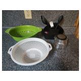 Strainers, kitchen organizer. Glass jar