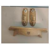 Vintage sconces and a small shelf