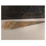 Hand saw. Blade is 26" long