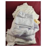 Sheets, pillow cases and a towel and washcloth