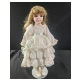 16" porcelain doll blonde hair, blue eyes, white