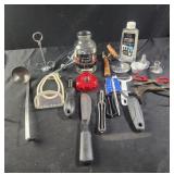 Assorted kitchen tools, peelers. Ladle, coffee