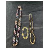 2 necklaces and bracelet