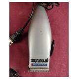 Remington Precision and Sunbeam electric razors.