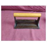 Cast iron bacon press