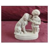 Vintage boy with his dog statue
