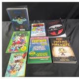 Assorted books, fortnight, Pokï¿½mon, gaming,