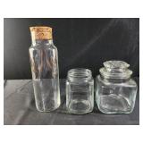 Glass containers and a square jar