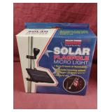 Solar flagpole micro light