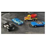 2 Hot Wheels and 2 Matchbox die cast cars