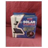 Solar flagpole micro light