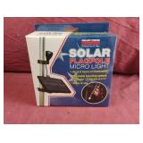Solar flagpole micro light