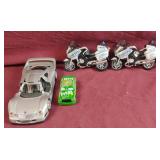 Toy cars and NYPD motorcycles
