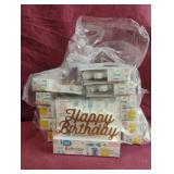 Gold Happy Birthday candles. 12 total