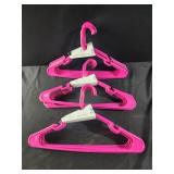 30 new plastic pink hangers