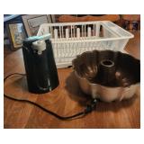 Dish rack, electric can opener,  bundt cake pan