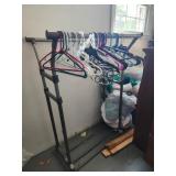 Clothes rack needs repair and hangers