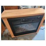 Electric fireplace 32x26x12 has a dent in vent