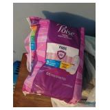 Poise pads. Open bag