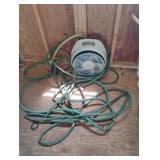 Water hoses and an Ames reel