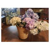 Faux flowers in basket