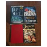 Assorted books, united states coin guidebook