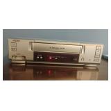Sanyo 4-Head VCR. Powers on