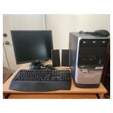 Acer desktop computer set up, monitor, tower,