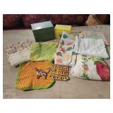 Metal recipe box, pot holders, wash rags, towels