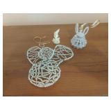 Angelic figurines. 1 has a broken wing