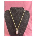 Vintage Joan Rivers purple pink rhinestone egg.