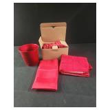 Red cloth napkins, red dish rag, red pail