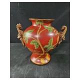 9" vase with lions head handles vine design