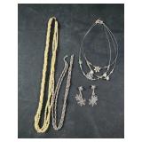 Snowflake earrings, silvertone chain Clasp is
