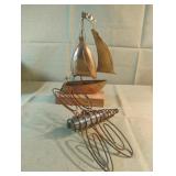 Metal nautical sailboat and dragonfly