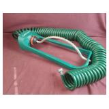 Gilmour sprinkler with coil hose