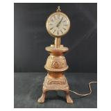 Vintage brass pot belly stove clock light 19"