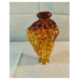 Vintage grape cluster glass bottle