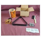 Sandpaper, pocket prayer quilts, brush and
