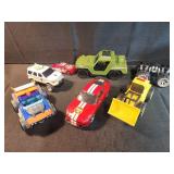 Assorted toy cars and trucks