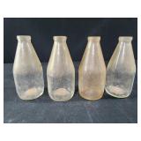 Four 5 5" vtg clear glass bottles