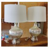 2 silver lamps