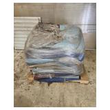 Pallet of used moving blankets