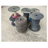 Partial small rolls of braided wire. 6 rolls