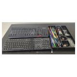 Dell and Microsoft keyboards and pens and clips