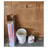 Clear plastic, bucket, bug spray, shingles, horse