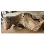 Pup pup wooden sculpture by Raymund Coins