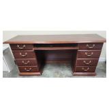 66x29x19 desk with filing cabinet drawers, has