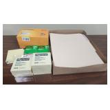 Envelopes, sticky notes, folders tape
