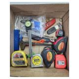 Measuring tapes. Box cutters, calipers